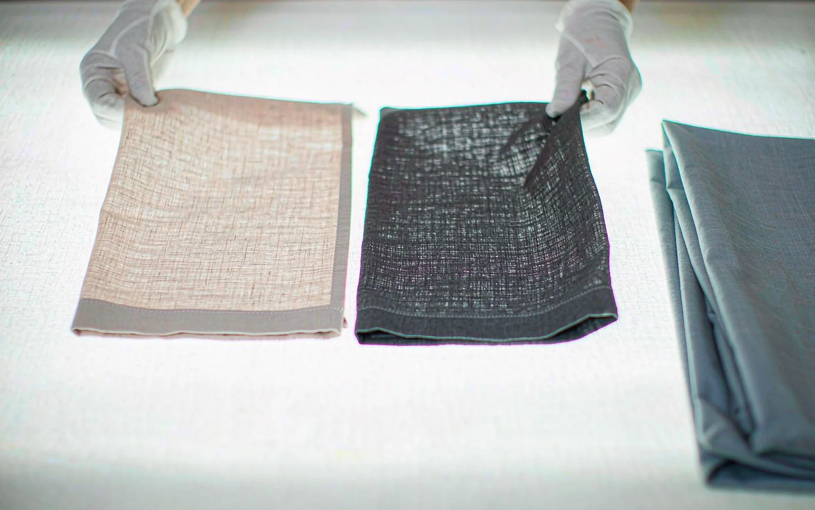 Fabric swatches compared side by side for colour consistency