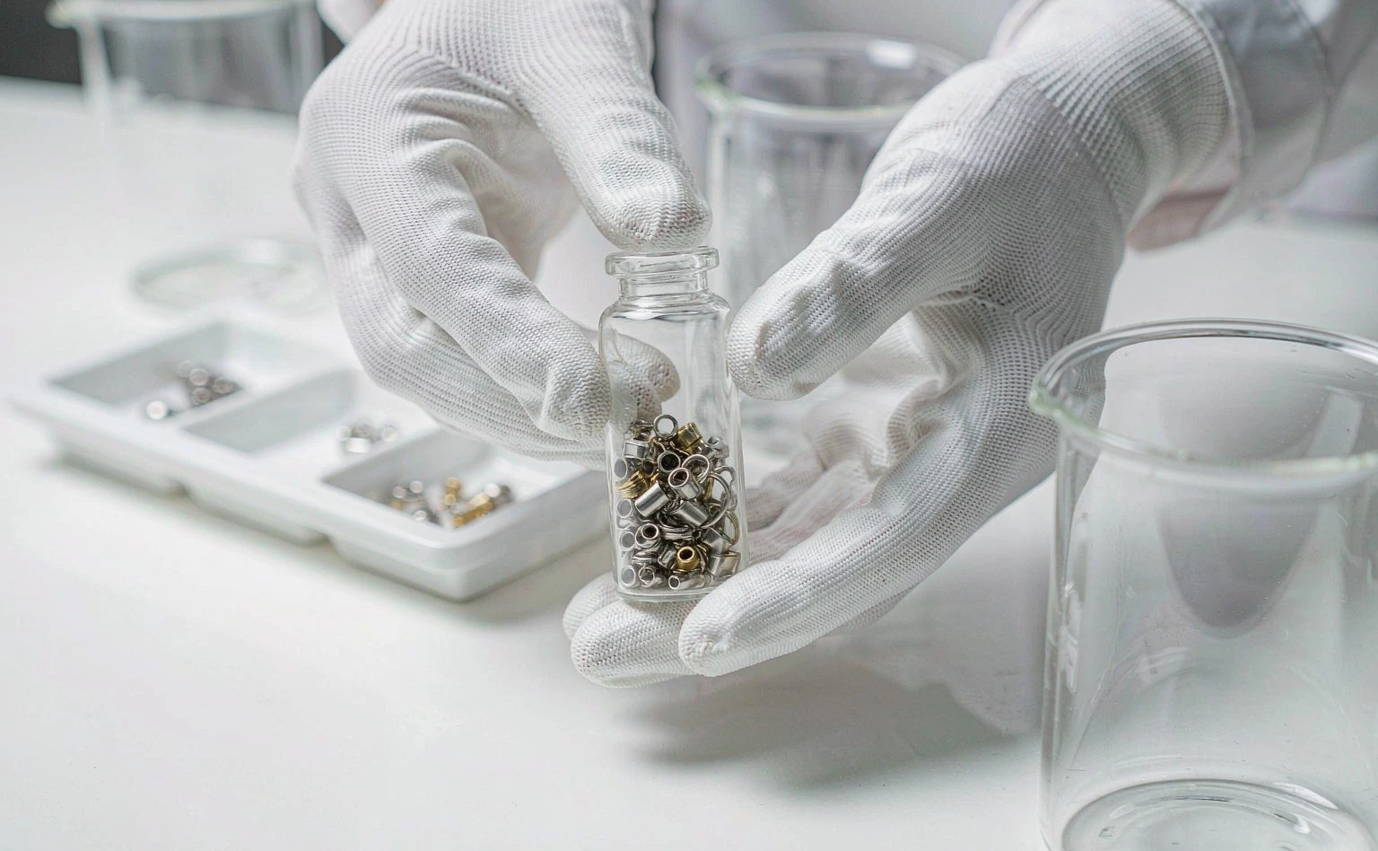 UTS technician running product component tests in a laboratory