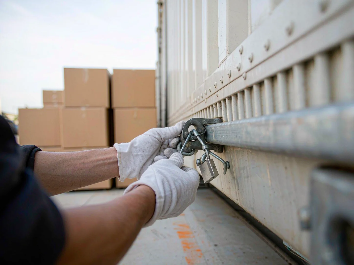 Cartons being counted and loaded at the factory loading dock